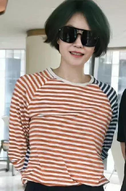 王菲杂志封面_王菲在时尚活动中拍摄杂志封面,造型引人瞩目_王菲杂志